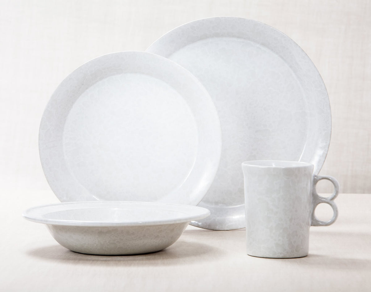 White on White dinnerware 4 piece set including our dinner plate, lunch plate, rimmed soup pasta bowl and trigger mug.