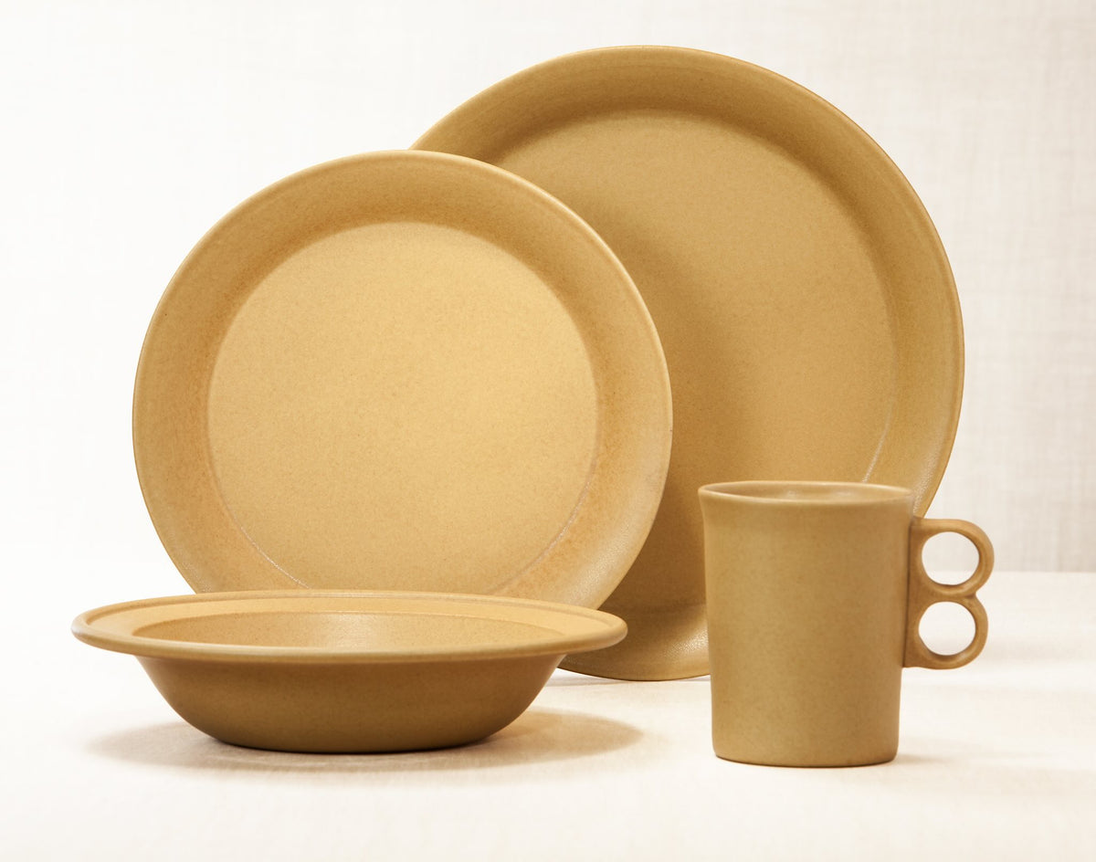 Element Gold dinnerware 4 piece set including our dinner plate, lunch plate, rimmed soup pasta bowl and trigger mug.