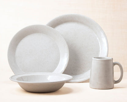 White on White dinnerware 4 piece set including our dinner plate, lunch plate, rimmed soup pasta bowl and tankard mug.
