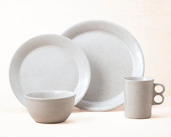 White on White dinnerware 4 piece set including our dinner plate, lunch plate, medium basic bowl and trigger mug.