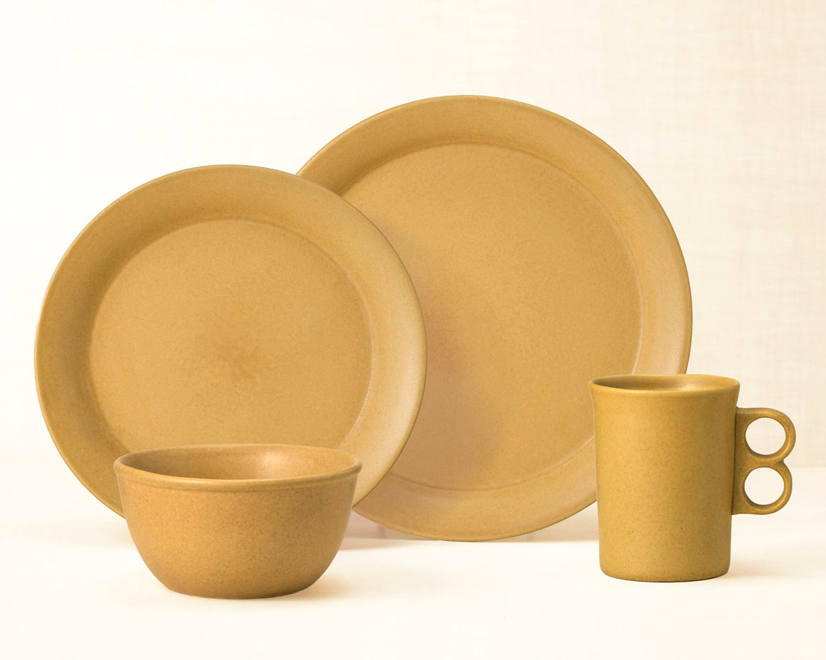 Element Gold dinnerware 4 piece set including our dinner plate, lunch plate, medium basic bowl and trigger mug.