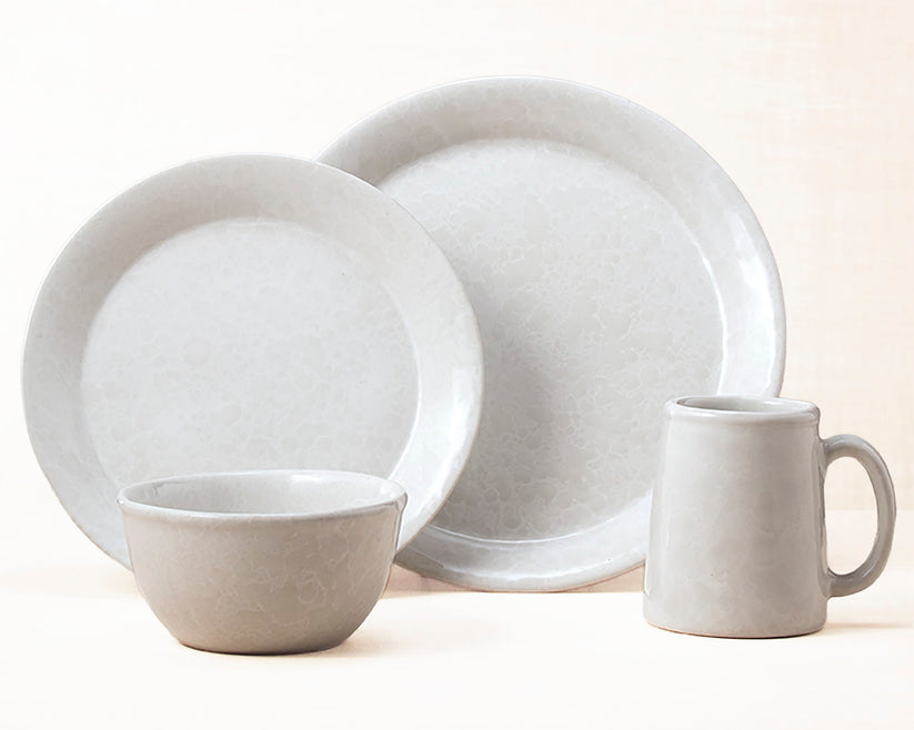White on White dinnerware 4 piece set including our dinner plate, lunch plate, medium basic bowl and tankard mug.